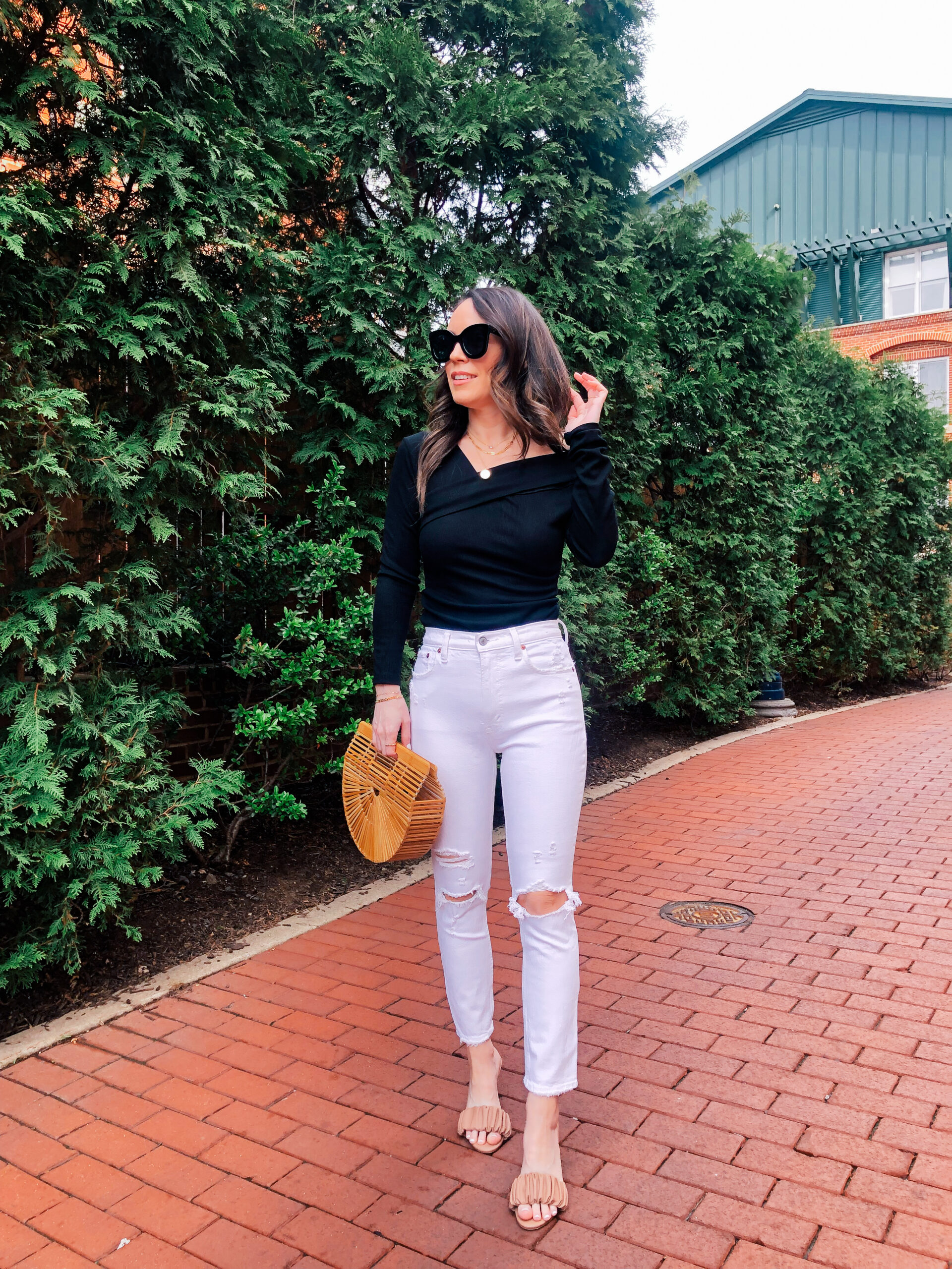 black top and ripped denim