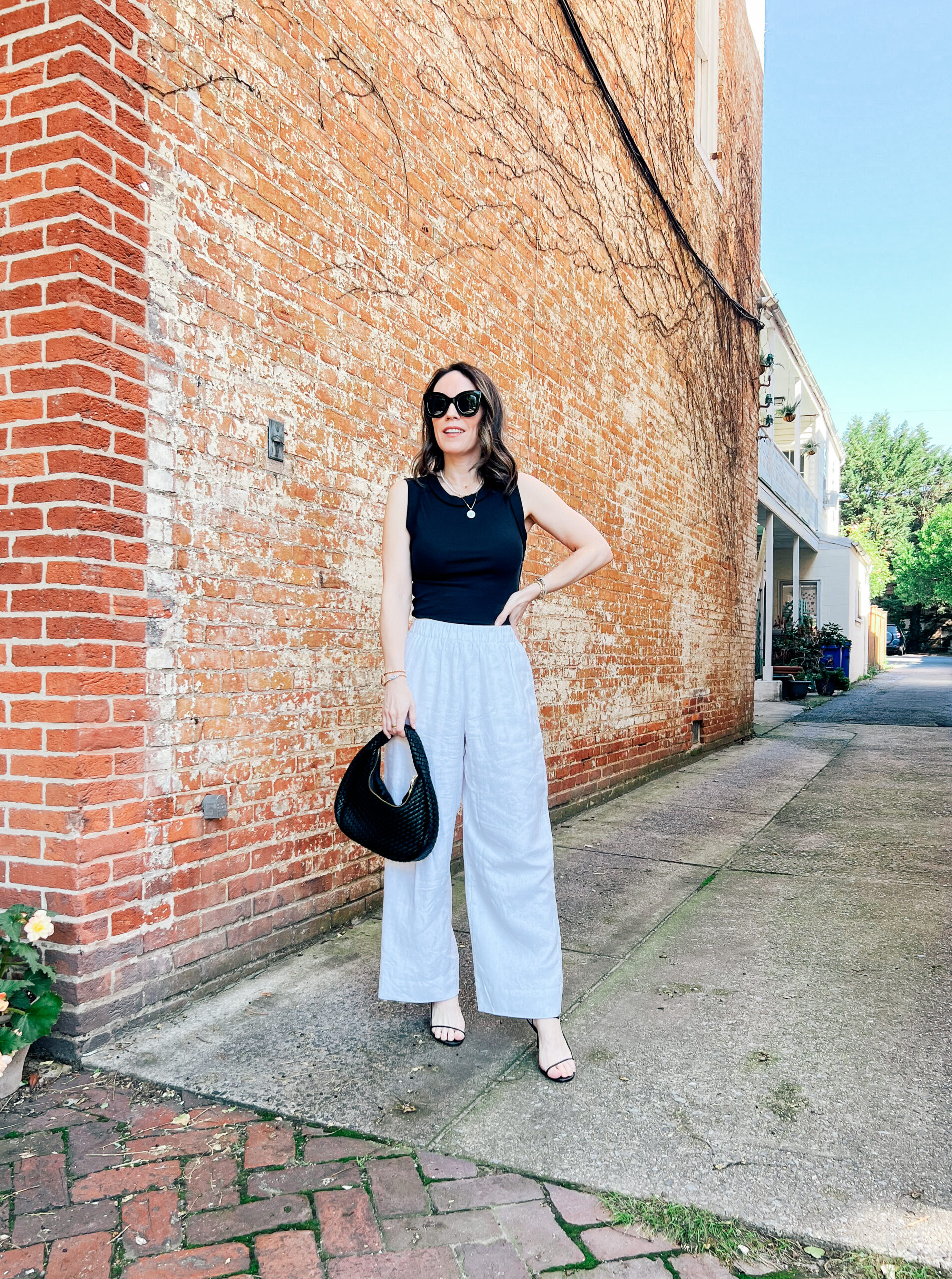 black tank and Abercrombie pants